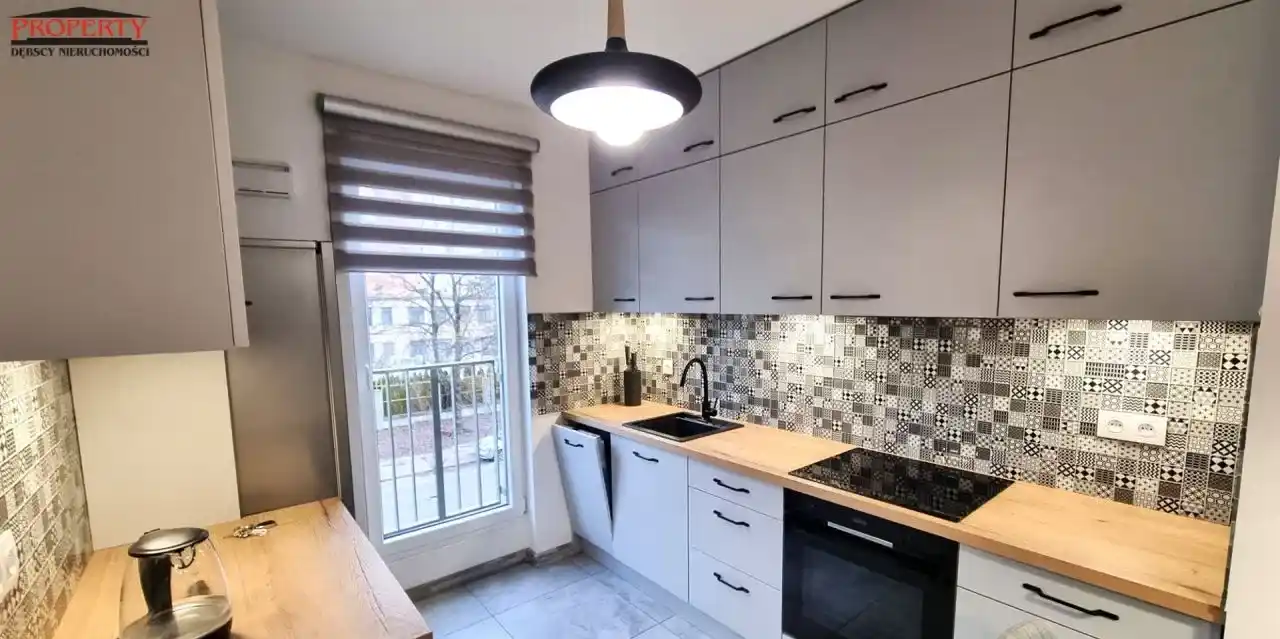Elegancki apartament z garażem i komórką - zdjęcie 6