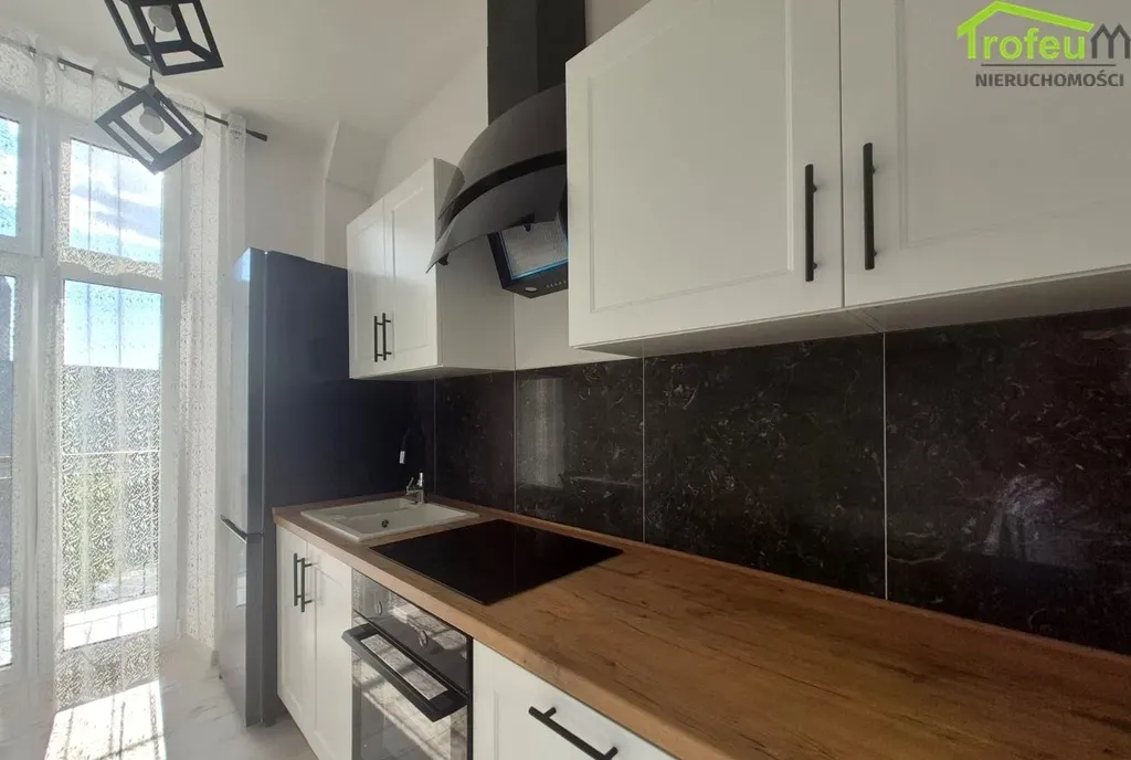 Mieszkanie 78 m² 3 pokoje, I piętro Centrum Miasta - zdjęcie 2