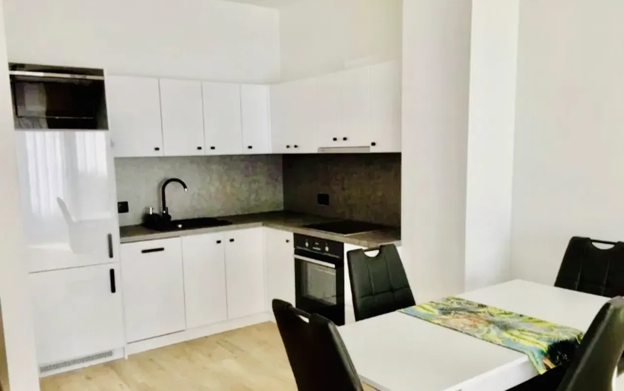 Nowe i eleganckie 2 pokojowe mieszkanie, balkon, garaż, blisko centrum - zdjęcie 6