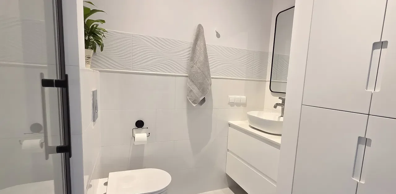 Jasna kawalerka w apartamentowcu w centrum Wilanowa - zdjęcie 6