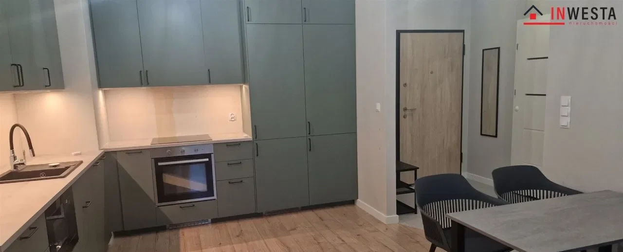Eleganckie mieszkanie 2-pokojowe z balkonem i garażem - zdjęcie 9