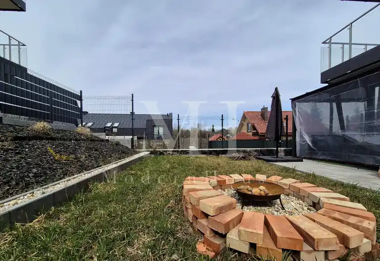 Nowoczesne mieszkanie z prywatnym ogrodem 100 m² - zdjęcie 10