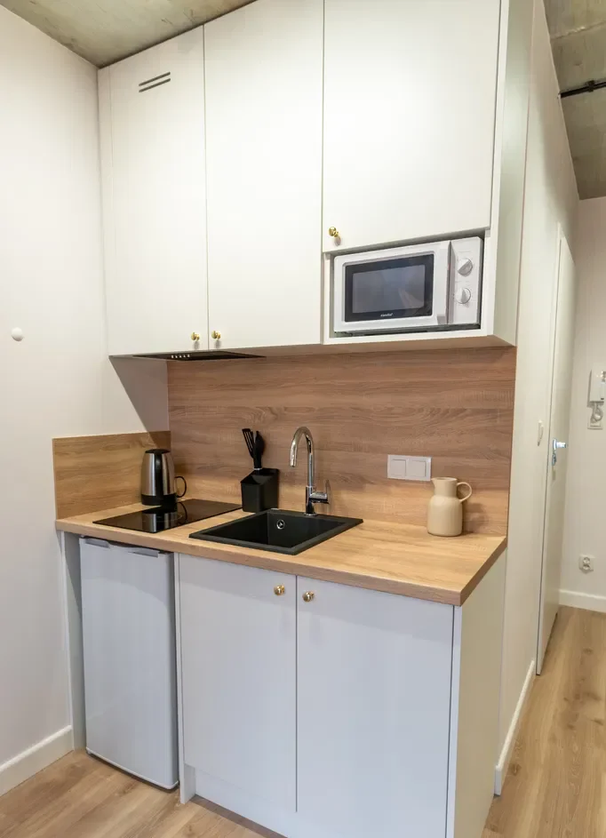 Lokal dwupoziomowy w nowoczesnym apartamentowcu - zdjęcie 3