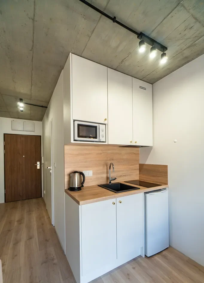 Przytulna kawalerka w nowoczesnym apartamentowcu - zdjęcie 4