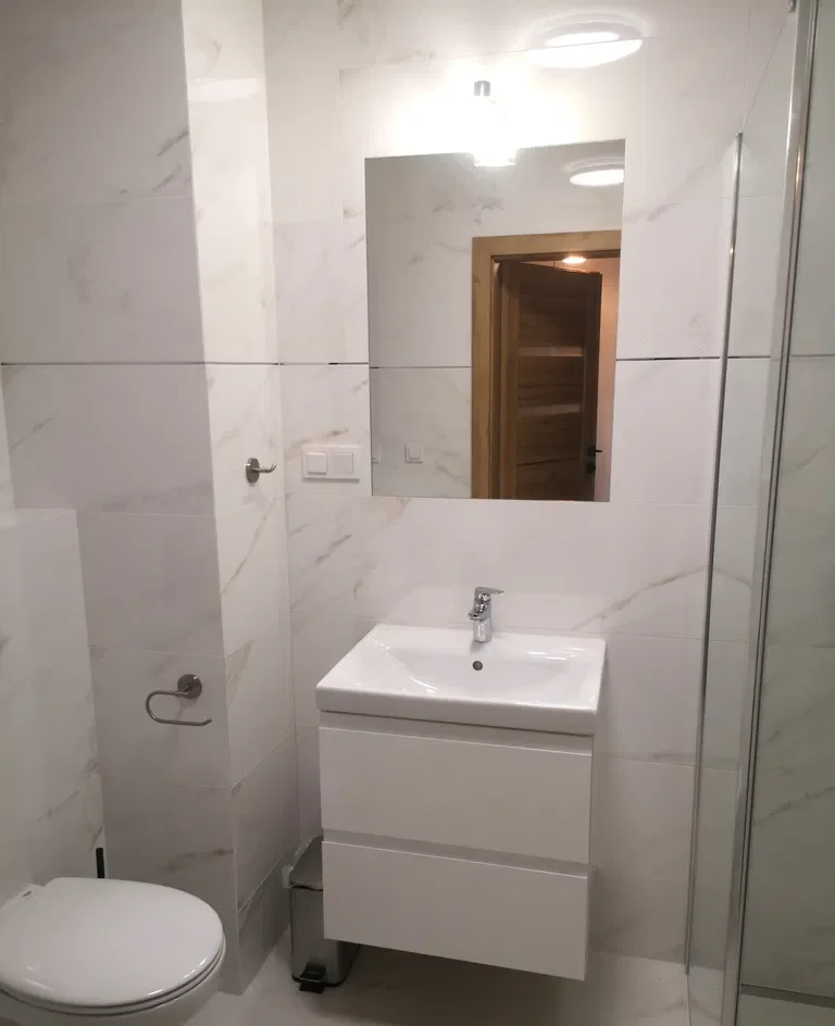 Komfortowe dwupokojowe mieszkanie z balkonem i garażem podziemnym - zdjęcie 9