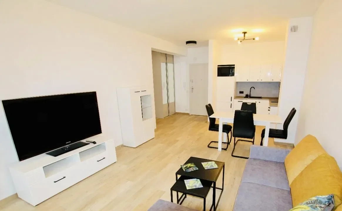 Nowe i eleganckie 2 pokojowe mieszkanie, balkon, garaż, blisko centrum - zdjęcie 2