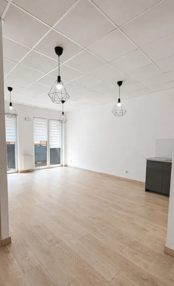 Jasne mieszkanie przy samym centrum w apartamentowcu - zdjęcie 2