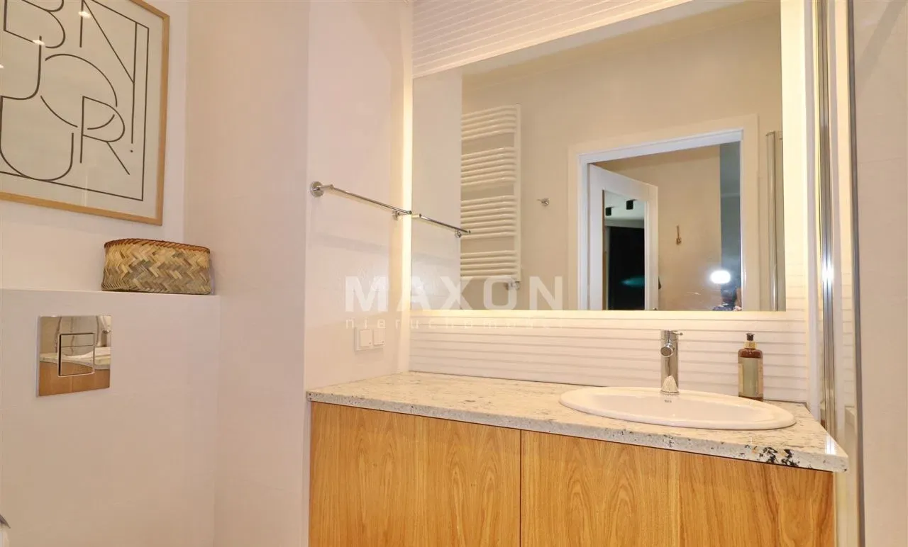 Ekskluzywne mieszkanie w Mennica Residence - zdjęcie 7
