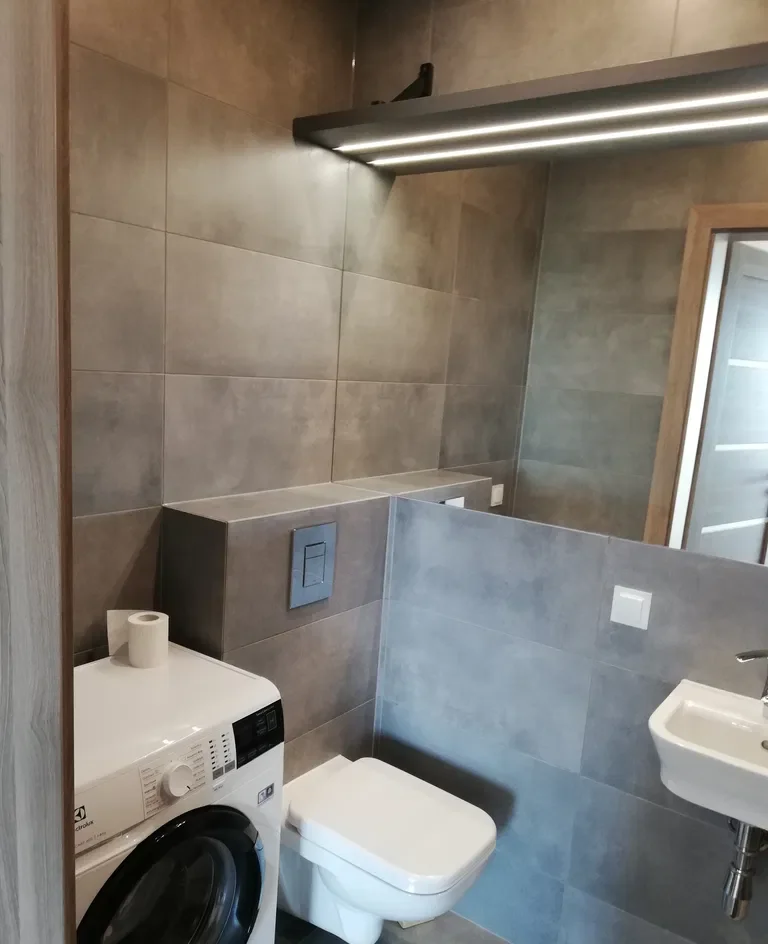Apartament z klimatyzacją, balkonem i garażem w Poznaniu - zdjęcie 10