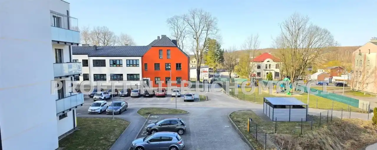 Nowoczesne mieszkanie z balkonem w otuline lasu - zdjęcie 7