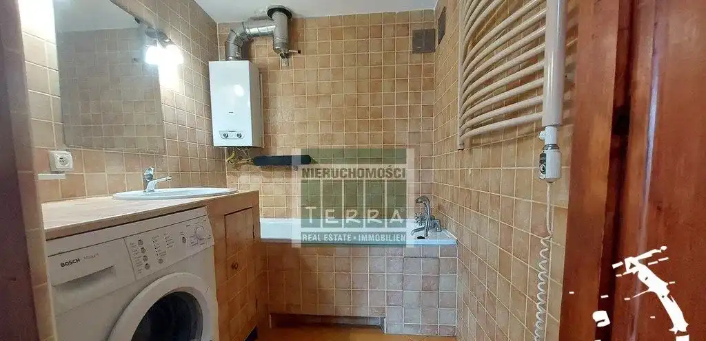 Klimatycznie w kamienicy z miejscem postojowym - zdjęcie 7