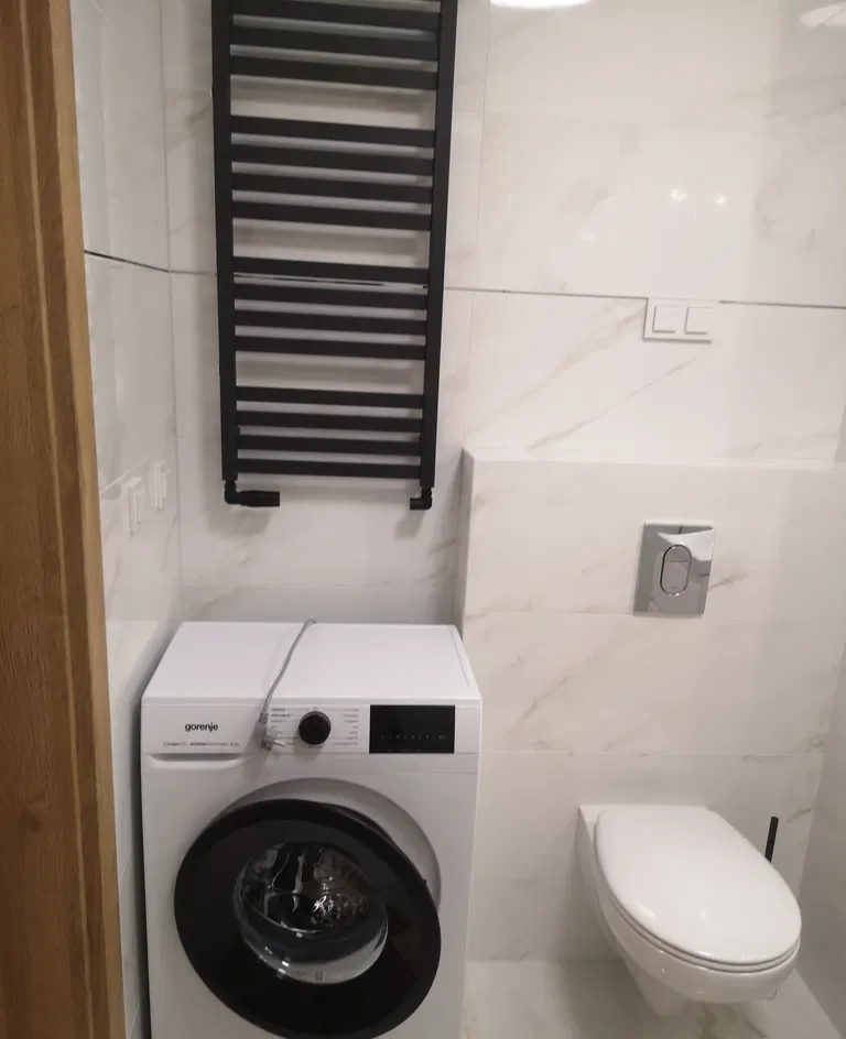 Komfortowe dwupokojowe mieszkanie z balkonem i garażem podziemnym - zdjęcie 10
