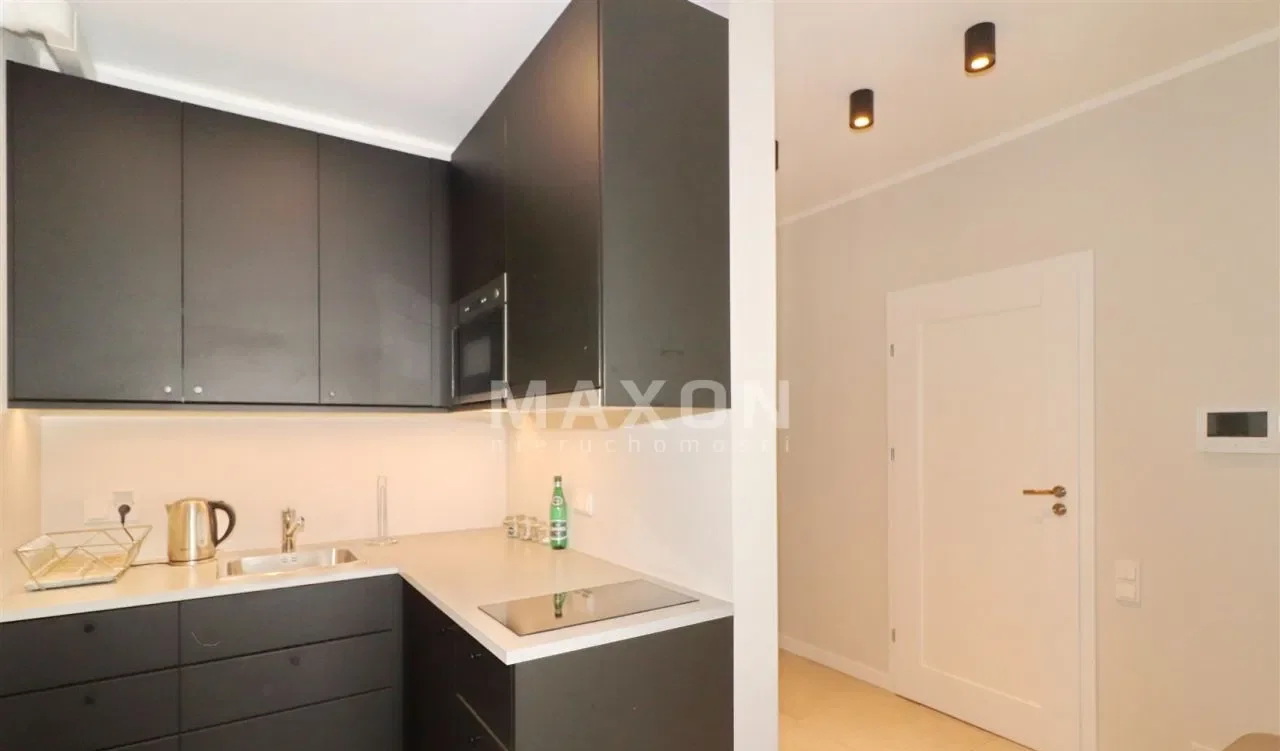 Ekskluzywne mieszkanie w Mennica Residence - zdjęcie 10