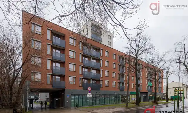 Kawalerka z wydzieloną sypialnią w apartamentowcu - zdjęcie 10